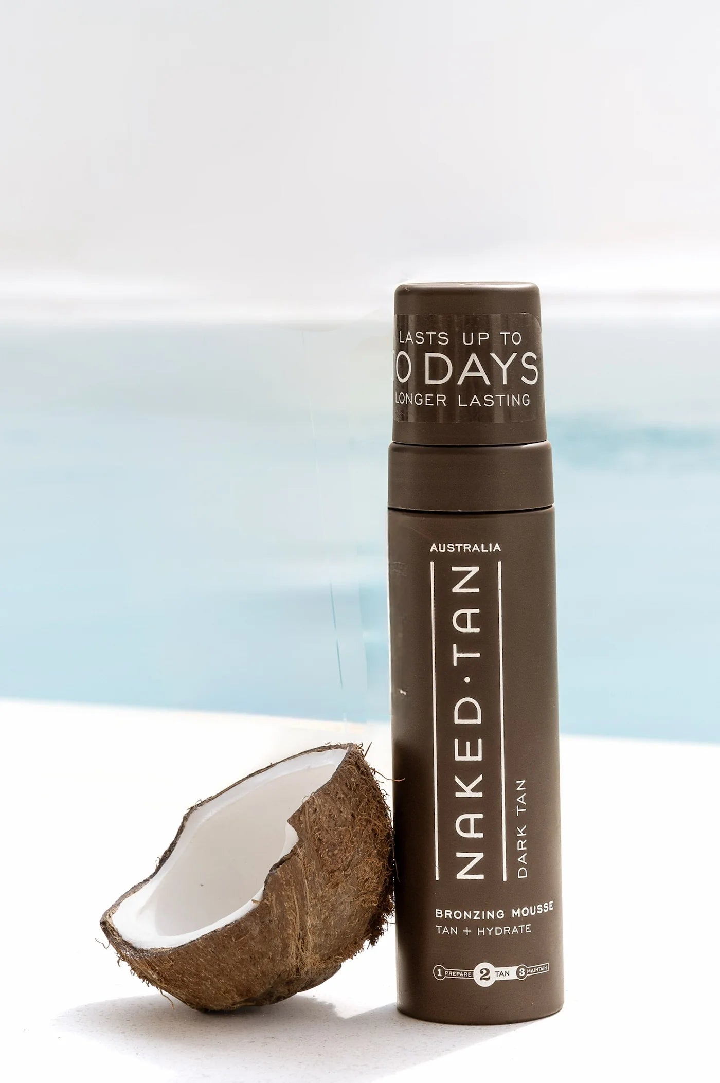 Naked Tan Dark Chocolate self-tanning mousse delivering a rich, deep tan with a smooth application