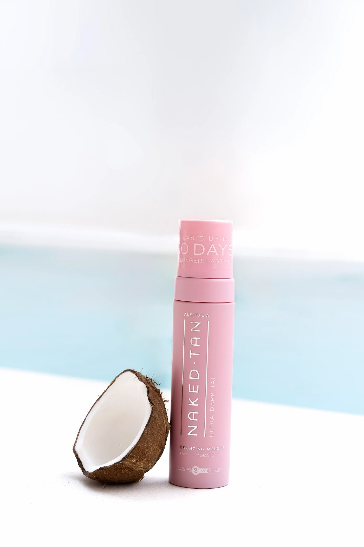 Naked Tan Ultra Dark self-tanning mousse for an intense, deep bronze tan with fast-drying formula